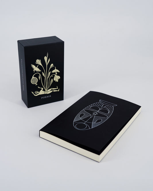 A set of Poesis Oracle Deck and Guide Book. The deck is inside a black box with gold designs, and the guide book is placed beside it with visible white and gold foil deboss on the cover.