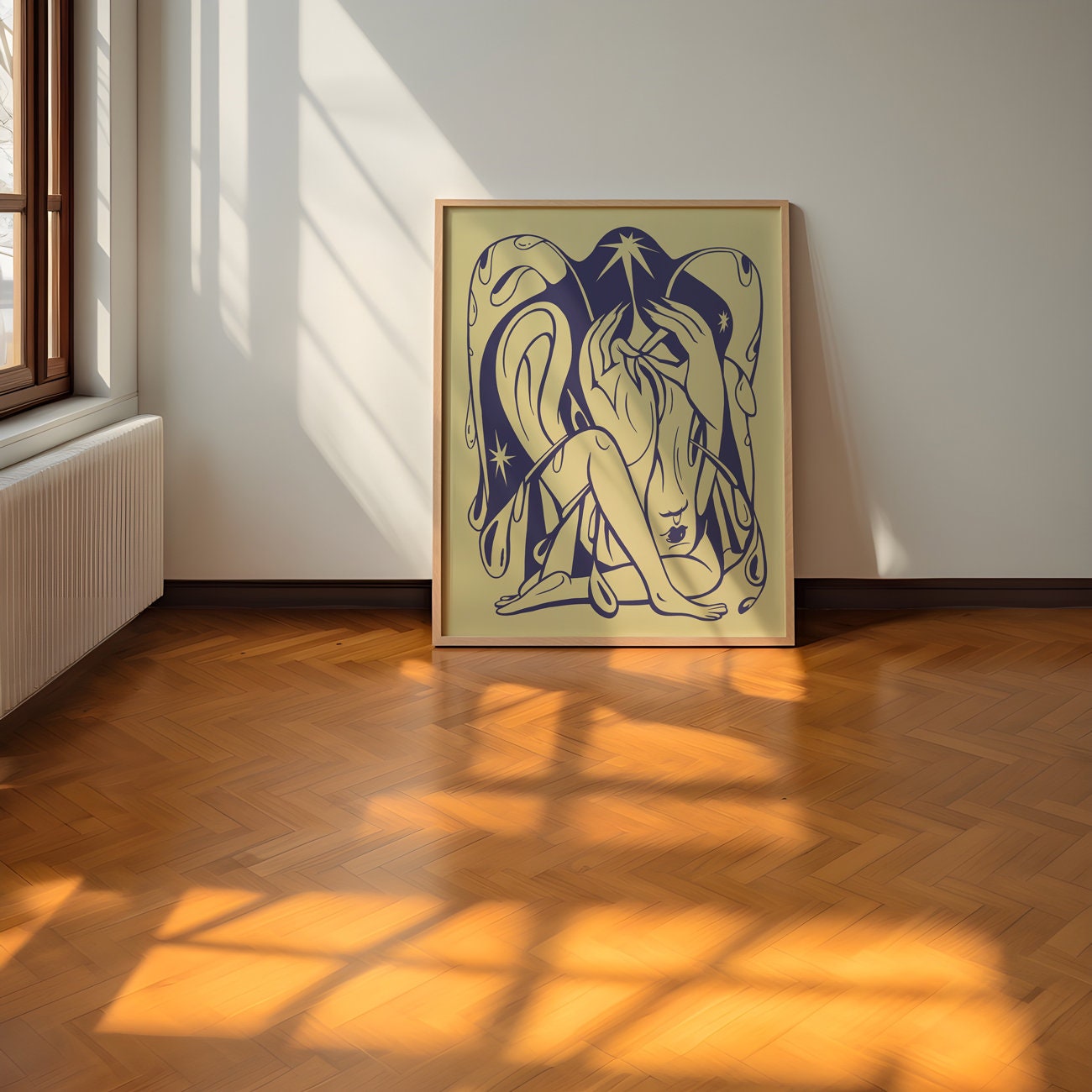 A poster featuring a minimalistic, abstract design with a figure in a sitting position, surrounded by fluid, curved lines in blue and beige tones, displayed against a wall in a well-lit room.