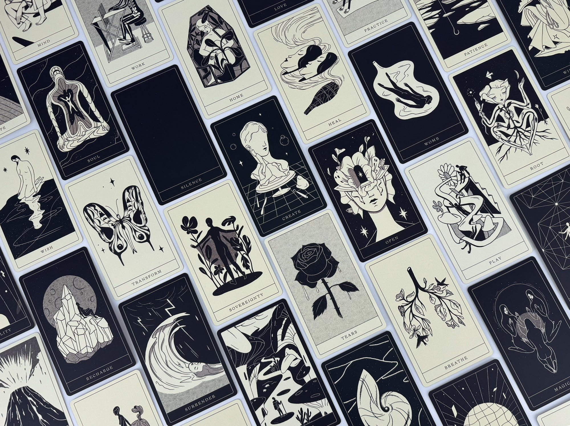 Pattern of tarot cards with black and white illustrations on a grid.