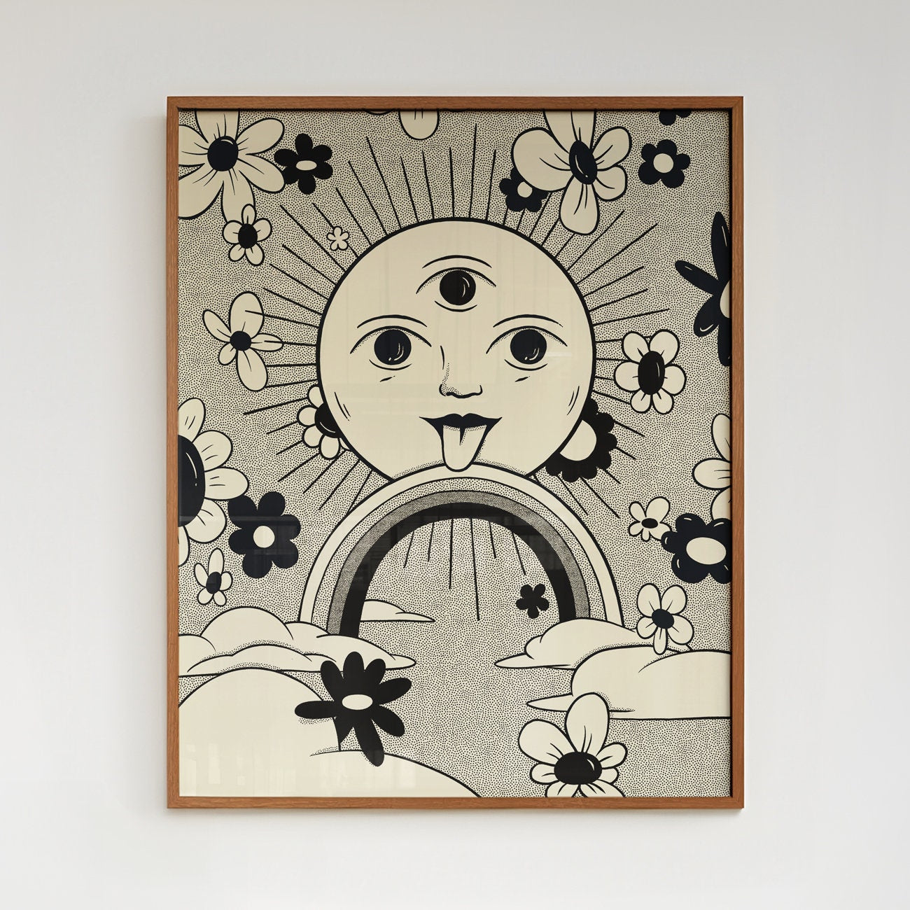 A framed poster featuring a black and white design with a stylized sun,along with floral patterns and a rainbow.